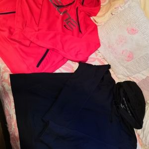 Nike thermafit hoodies medium one red one black